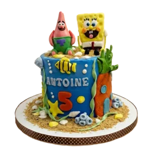 Custom under-the-sea kids birthday cake by Cakeville Scarborough with SpongeBob and Patrick figures and name inscription