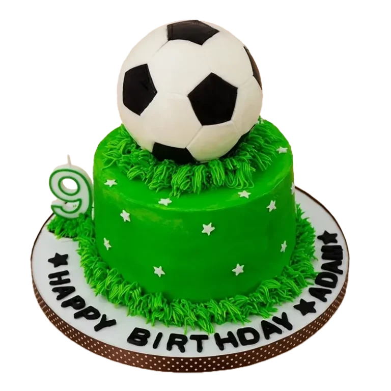 Green soccer pitch birthday cake with 3D soccer ball, grass texture, number nine candle, and Happy Birthday Adam inscription