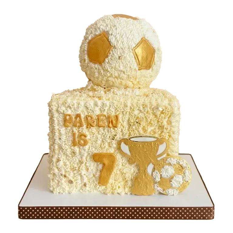 Square soccer birthday cake with 3D gold soccer ball topper, gold trophy, and Paren is 7 inscription