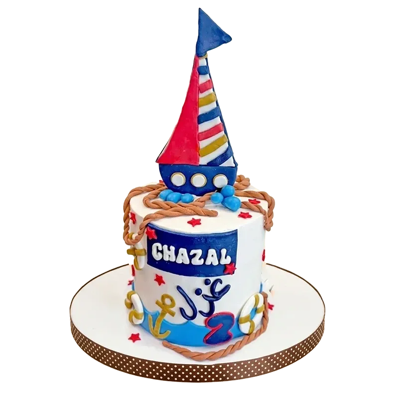 Nautical birthday cake with sailboat topper, rope border, anchors, and Chazal name and number two inscription