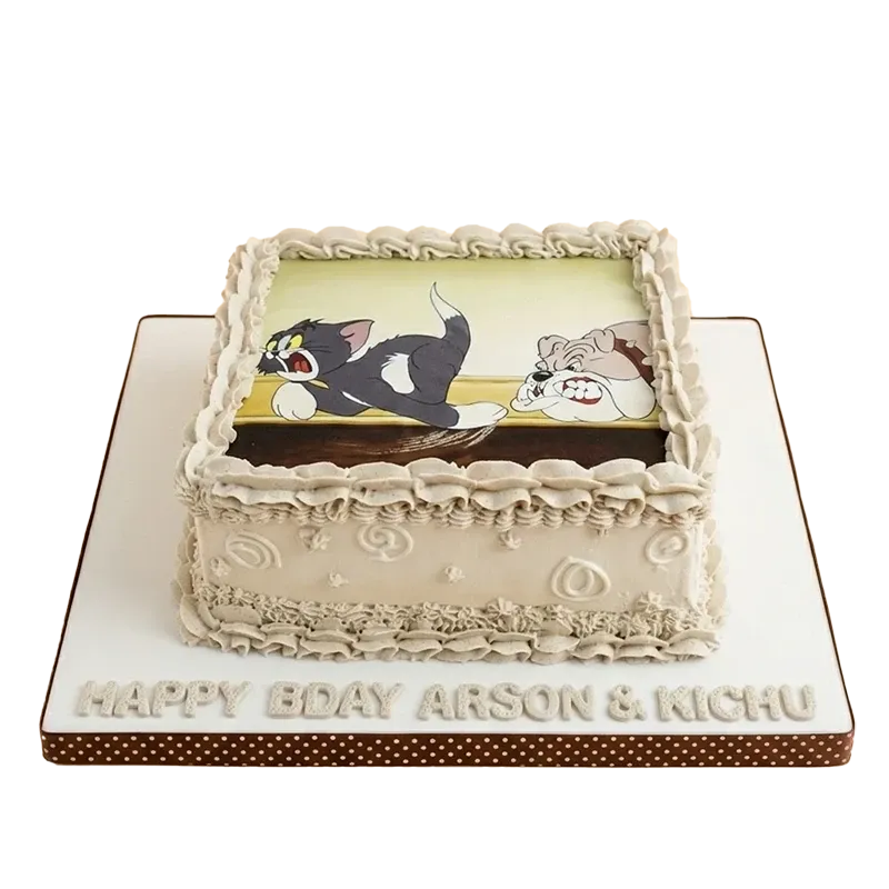 Square birthday cake with Tom and Jerry edible image topper and Happy Bday Arson and Kichu inscription