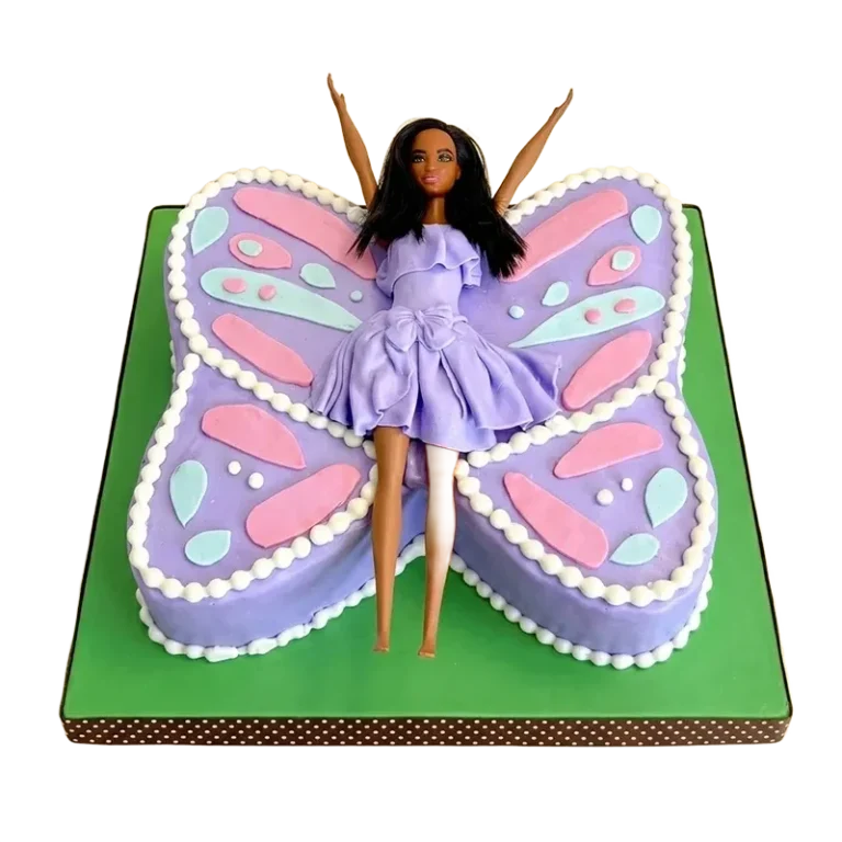 Purple butterfly-shaped birthday cake with Barbie doll centerpiece and pastel pink and teal wing designs