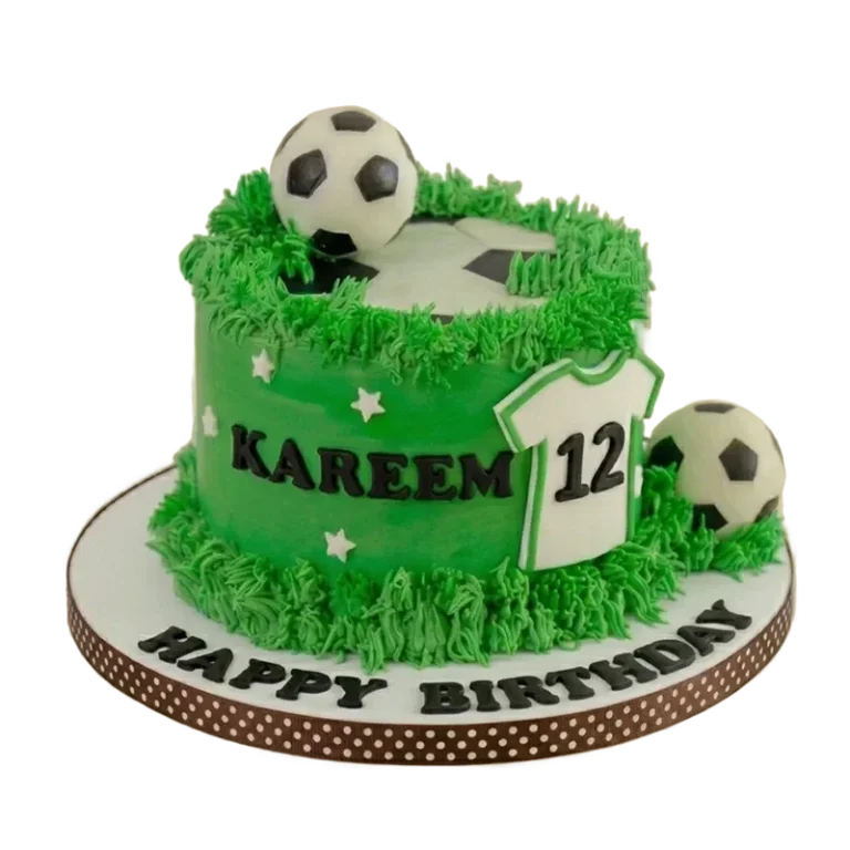 Green soccer field birthday cake with soccer balls, jersey number twelve, and grass texture