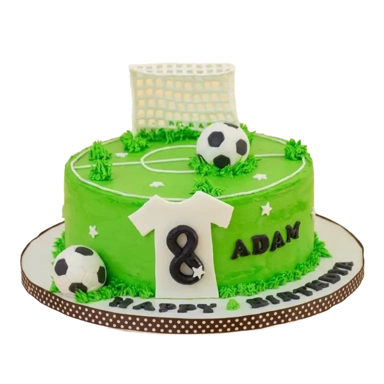 Green soccer field birthday cake with goal post, soccer balls, jersey, and number eight