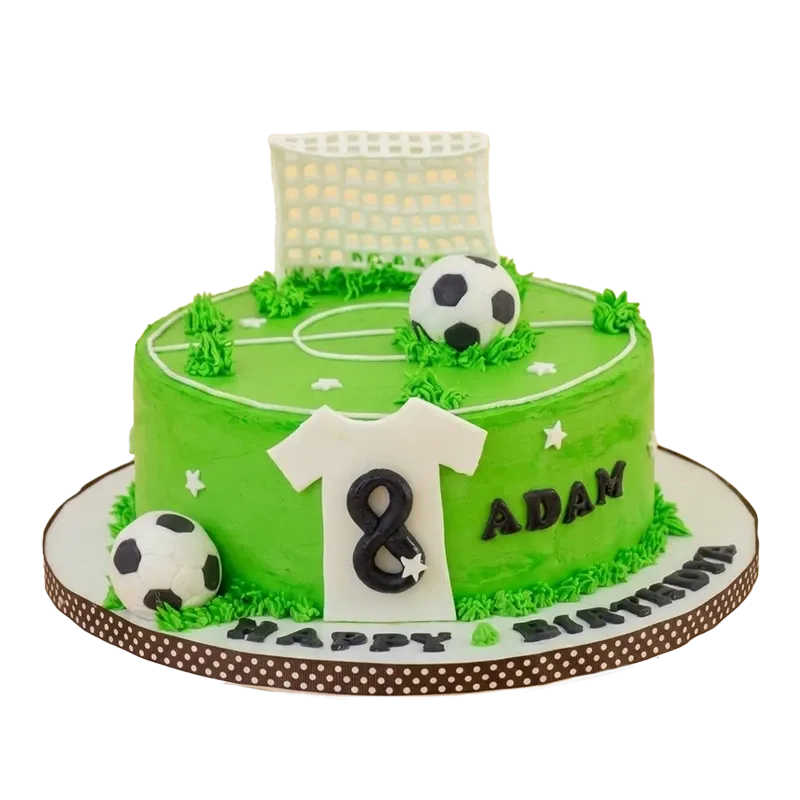 Green soccer field birthday cake with goal post, soccer balls, jersey, and number eight