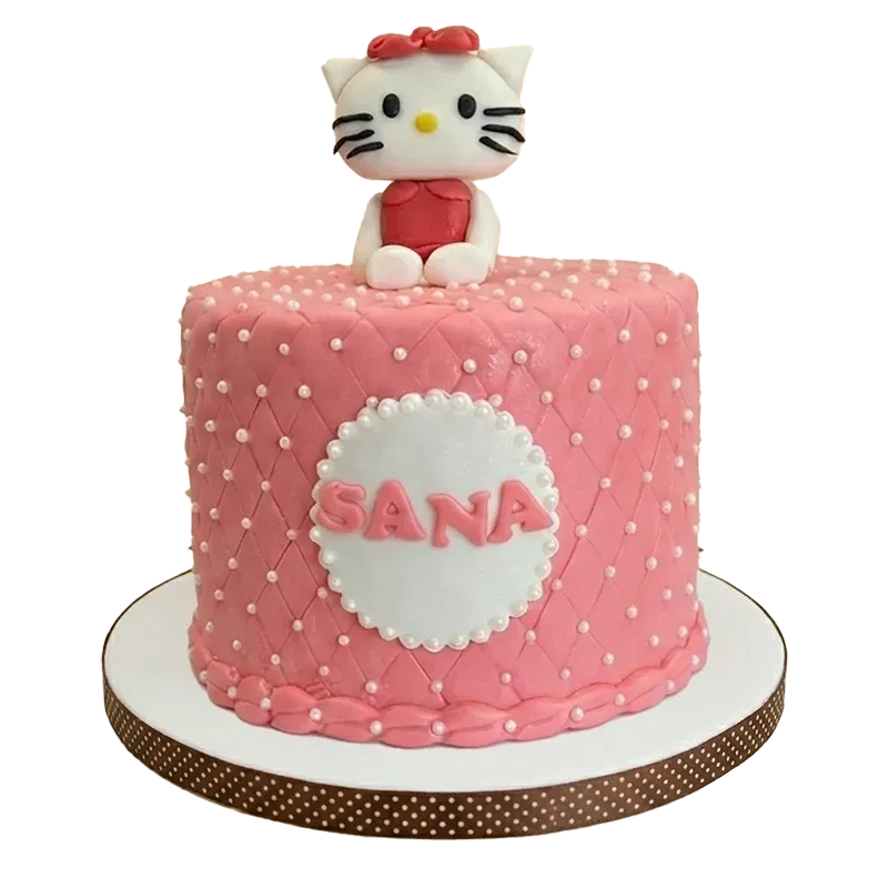 Pink quilted birthday cake with Hello Kitty figure topper, pearl dots, and name medallion