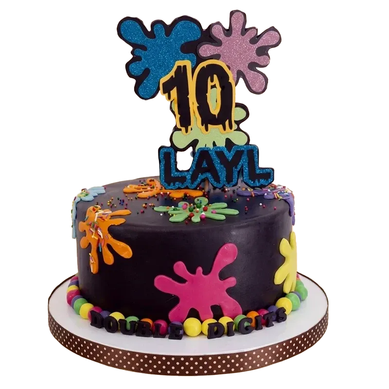 Dark graffiti-style 10th birthday cake with neon paint splats, name topper, and Double Digits inscription