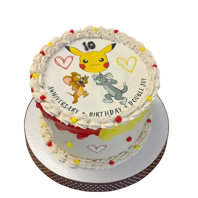 Two-tier anniversary birthday cake with Pikachu, Tom and Jerry characters, hearts, and Double Joy inscription
