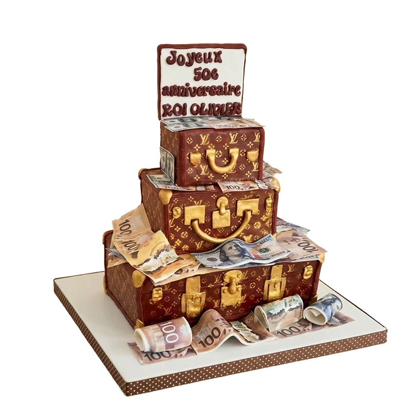 Three-tier 50th birthday cake shaped as stacked Louis Vuitton luggage with scattered banknotes