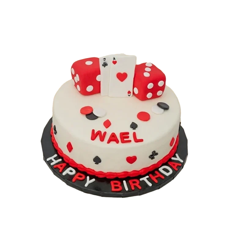 Casino-themed birthday cake with red dice, playing cards, poker chips, and card suit symbols