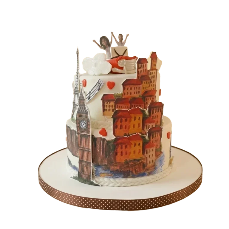 Travel-themed birthday cake with painted European cityscape, Eiffel Tower, and couple figures