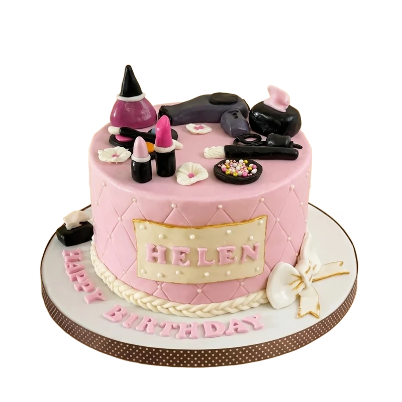 Pink quilted birthday cake topped with makeup items, lipstick, perfume, and white bow