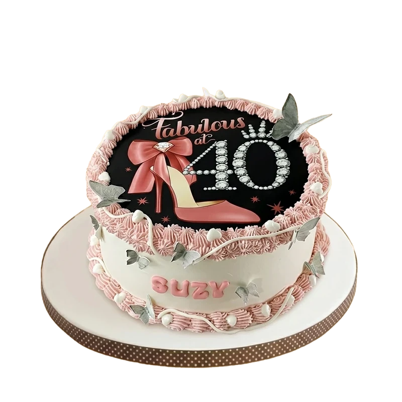 Two-tier 40th birthday cake with Fabulous at 40 design, high heel, pink rosettes, and silver butterflies