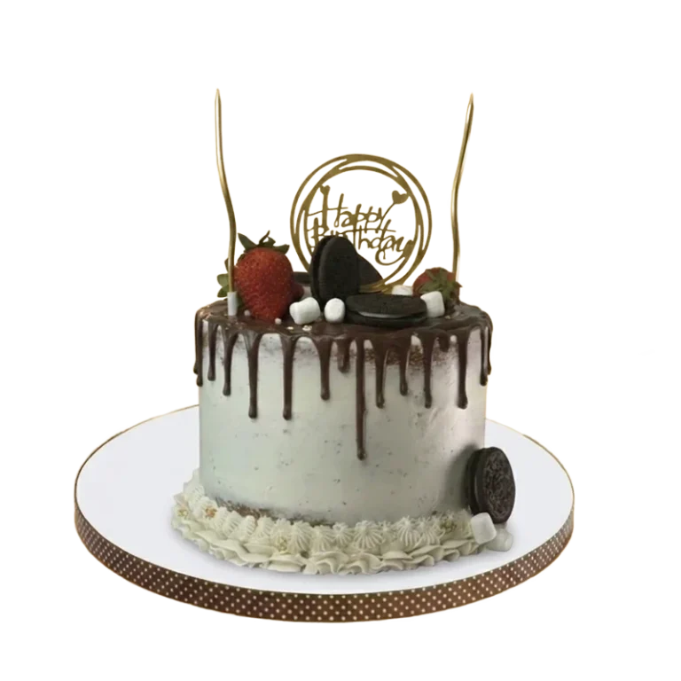 Birthday cake with chocolate ganache drip, Oreo cookies, strawberries, and Happy Birthday topper