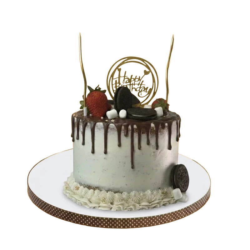 Birthday cake with chocolate ganache drip, Oreo cookies, strawberries, and Happy Birthday topper