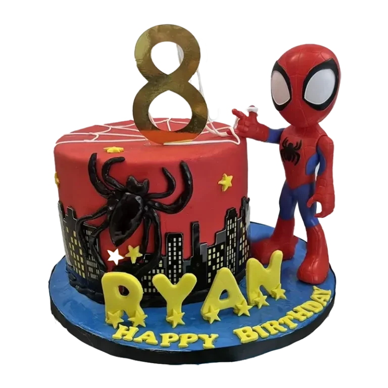 Red Spiderman kids birthday cake with Spiderman figure, city skyline, and gold number eight