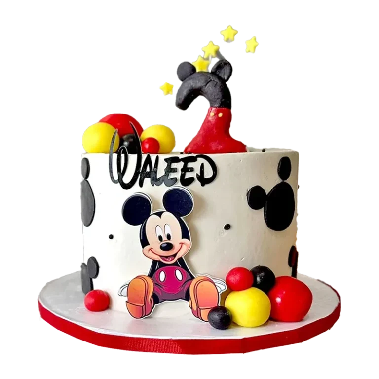 Mickey Mouse birthday cake with Mickey figure, red and yellow balloons, and name inscription