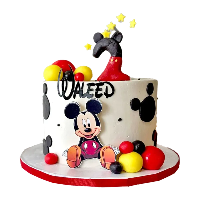 Mickey Mouse birthday cake with Mickey figure, red and yellow balloons, and name inscription