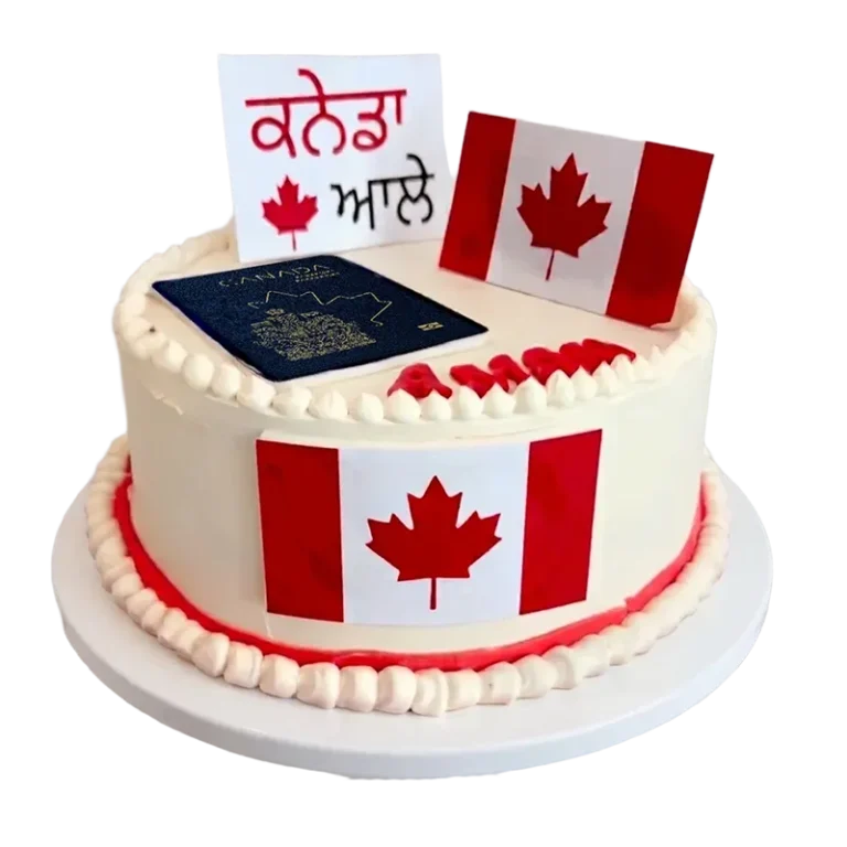 Canadian citizenship celebration cake with Canadian flags, passport topper, and Punjabi text