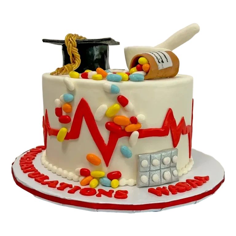 Pharmacy graduation cake with mortar and pestle, pills, ECG line, and graduation cap topper