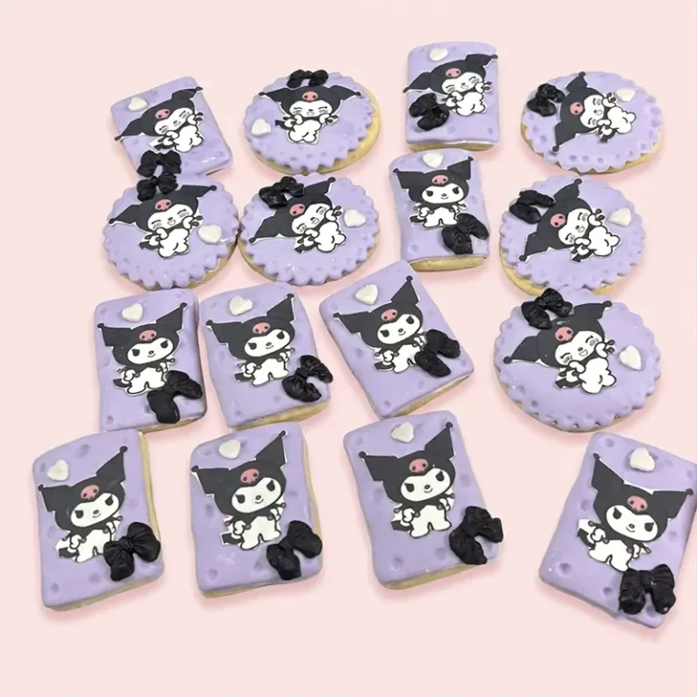 Lavender Mischief Kuromi character cookies with black bows in purple icing on round and square shapes
