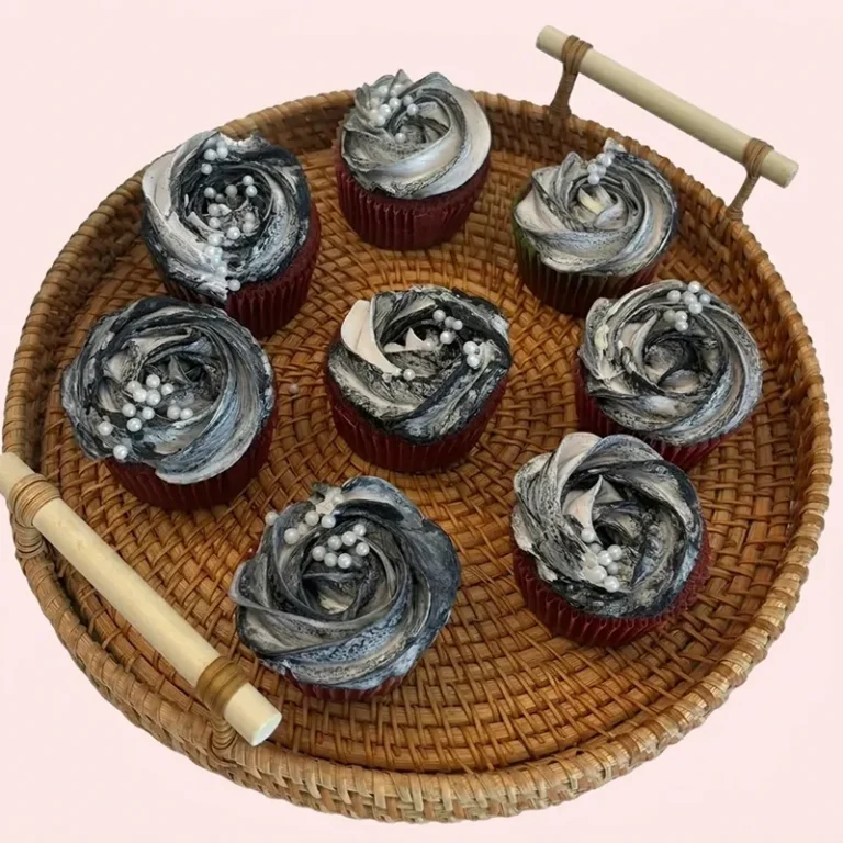 Midnight Marble cupcakes with dark swirled black and grey rosette frosting and white pearl sprinkles