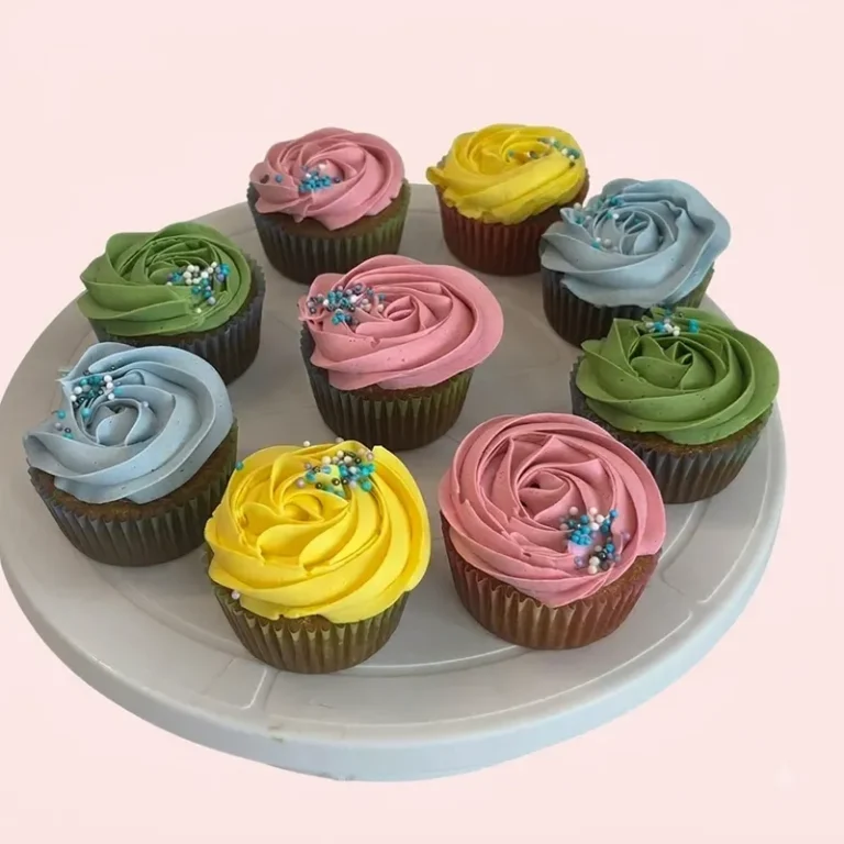 Pastel Swirls cupcakes with pink, blue, green, and yellow rosette frosting and sprinkles
