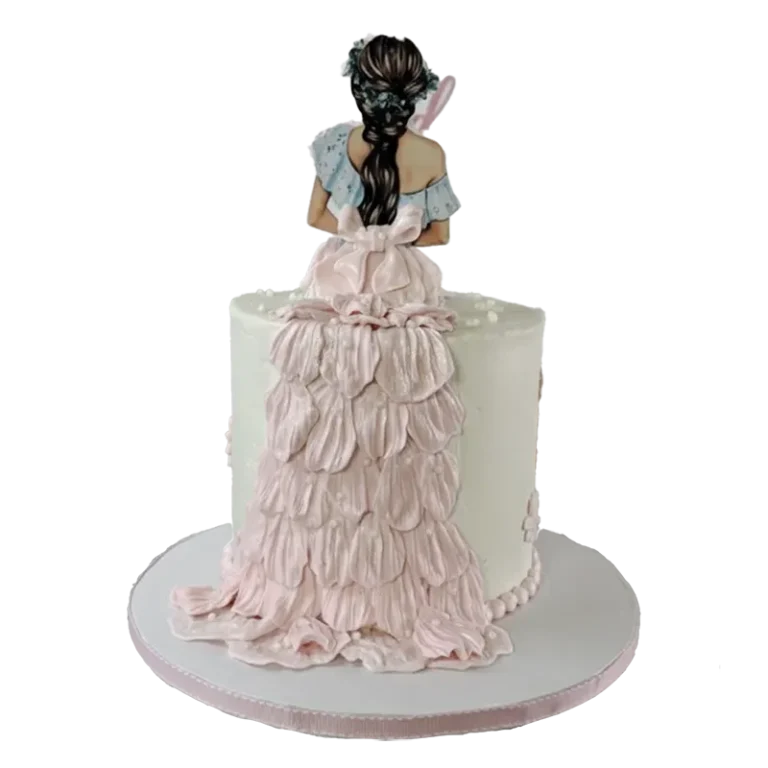 She Said Yes engagement cake with bride figure topper in pink ruffled gown and petal texture