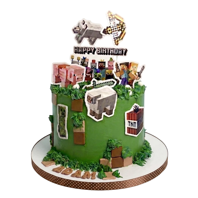 Green pixel game themed kids birthday cake with grass piping and block character toppers by Cakeville Scarborough