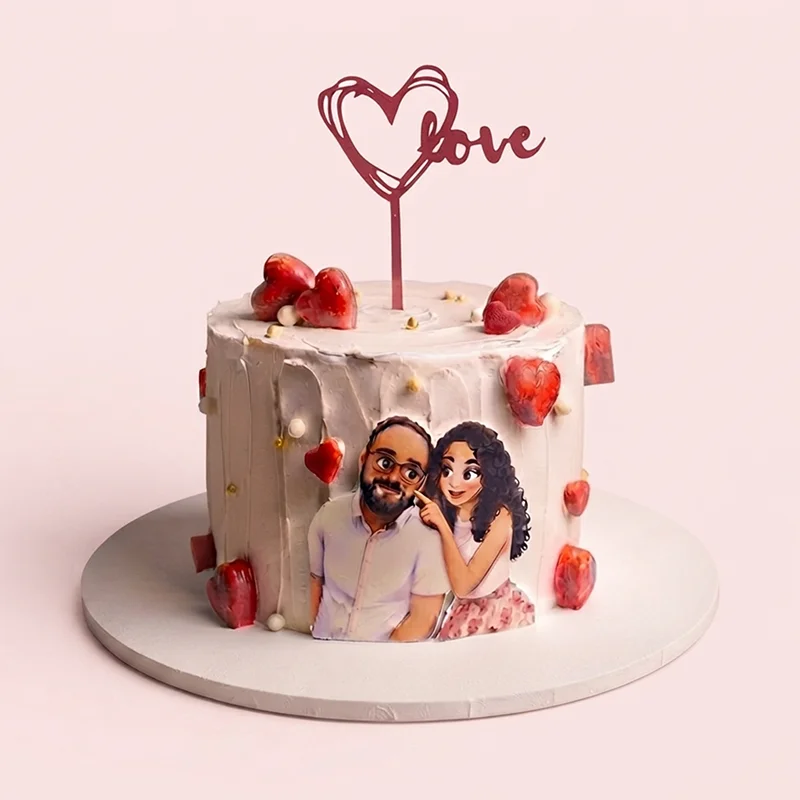 White textured anniversary cake with red hearts and couple illustration by Cakeville Scarborough